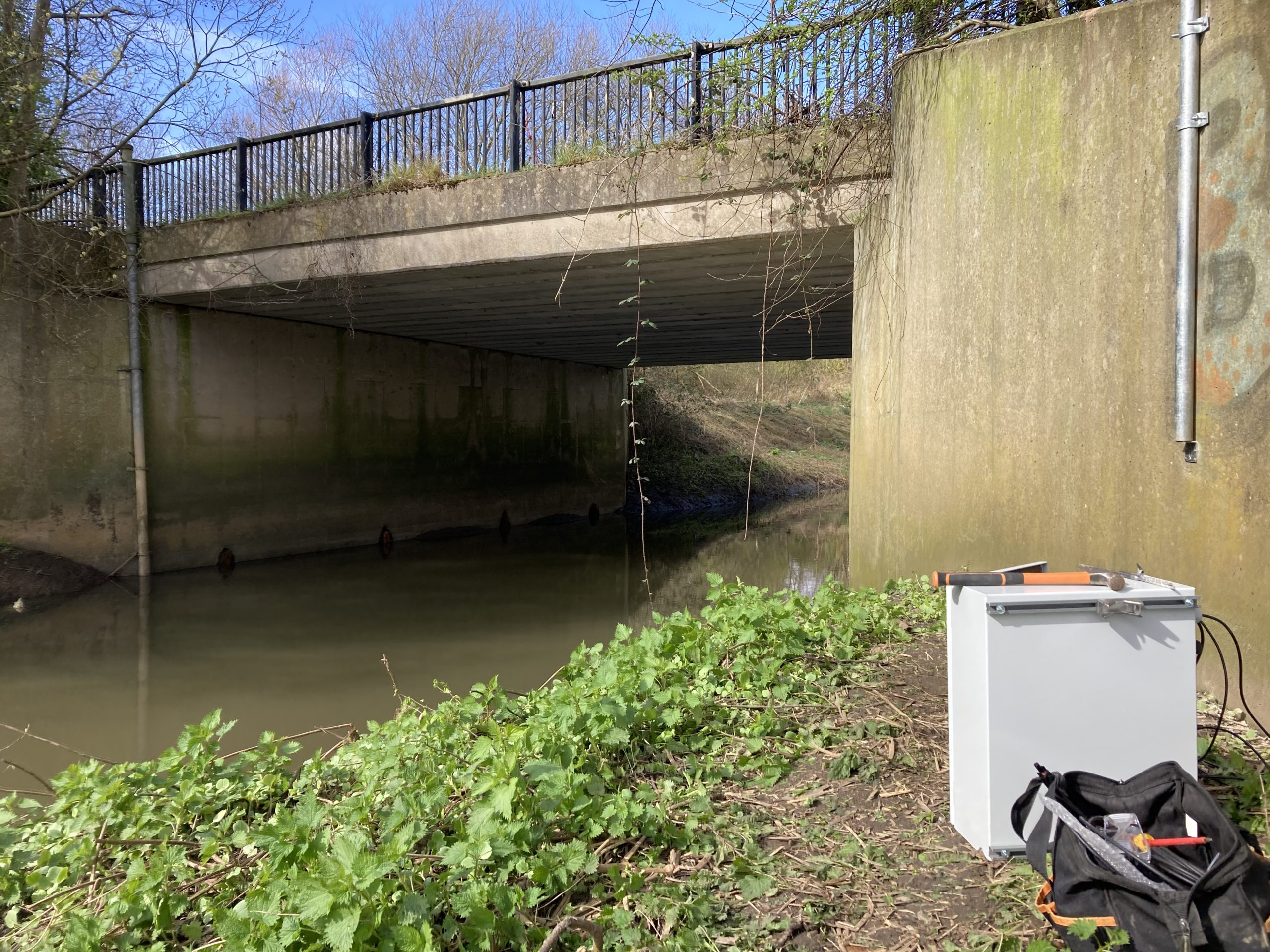 Image of the flow monitoring site showing Lustrum Beck passing underneath a road bridge